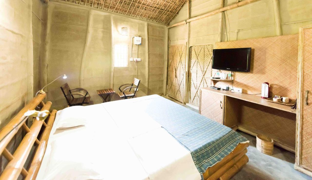 Zizina Otis Resort Guwahati Buitenkant foto